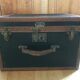 Old square travel trunk J Penet