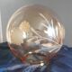 Vintage globe suspension in amber glass, chiseled floral decoration - 80s