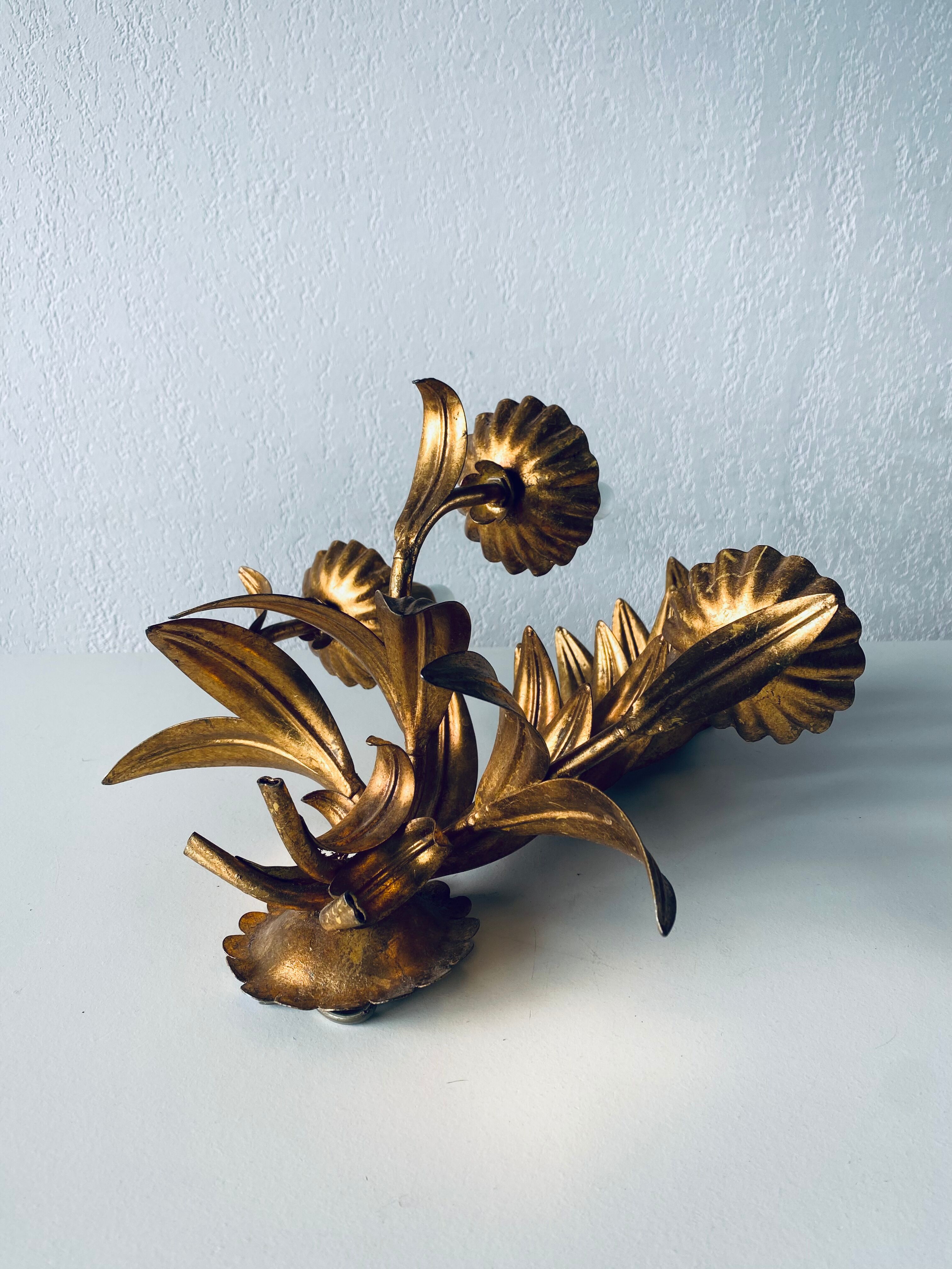 Golden leaf wall light