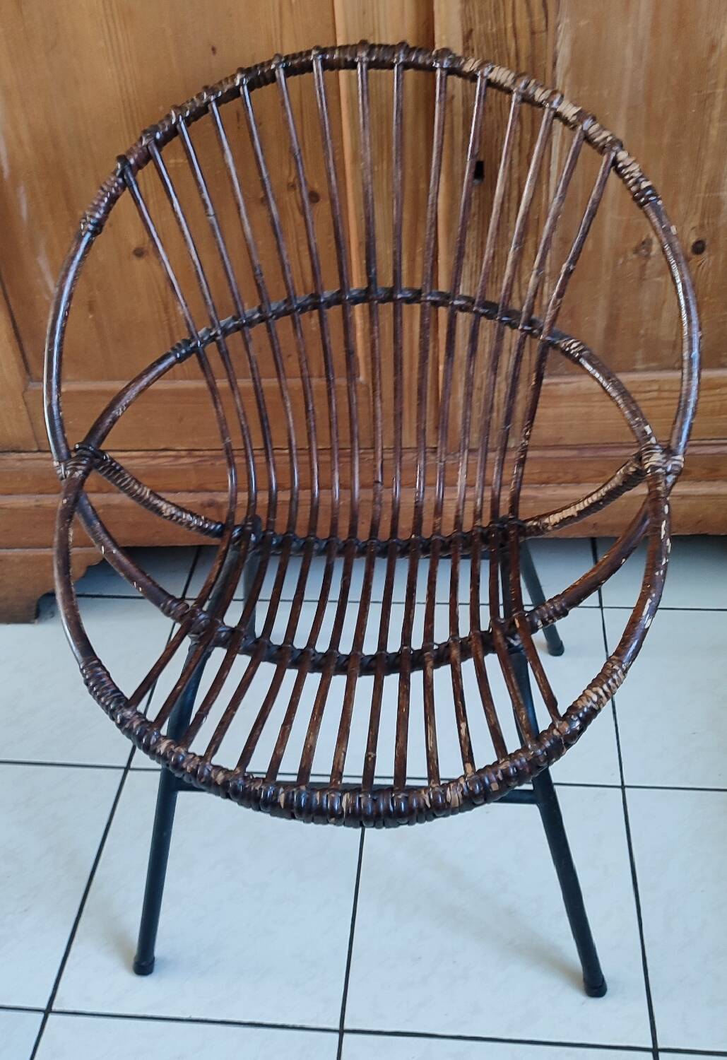 Rattan and metal shell armchair