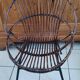 Rattan and metal shell armchair