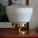 Table lamp brass and glass white
