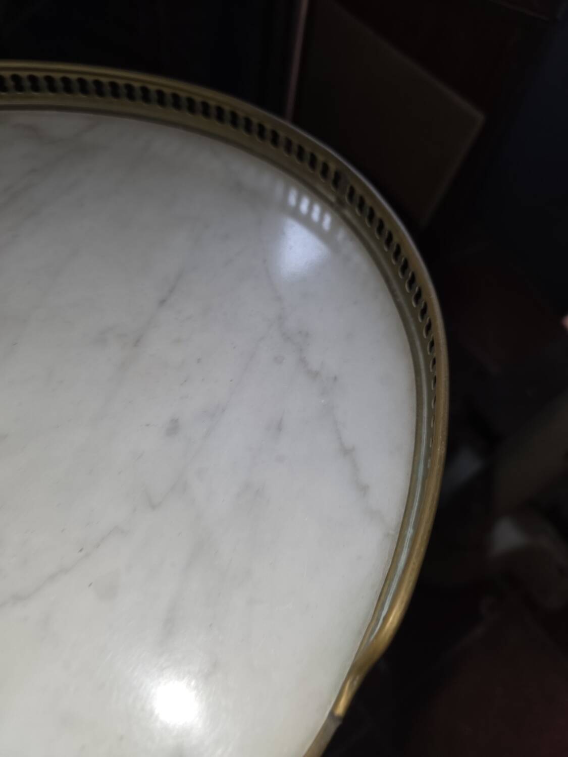 Pair of Louis XVI style bedside tables in mahogany, with marble tops.