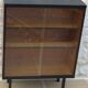 Storage unit, display cabinet with sliding glass doors, metal base