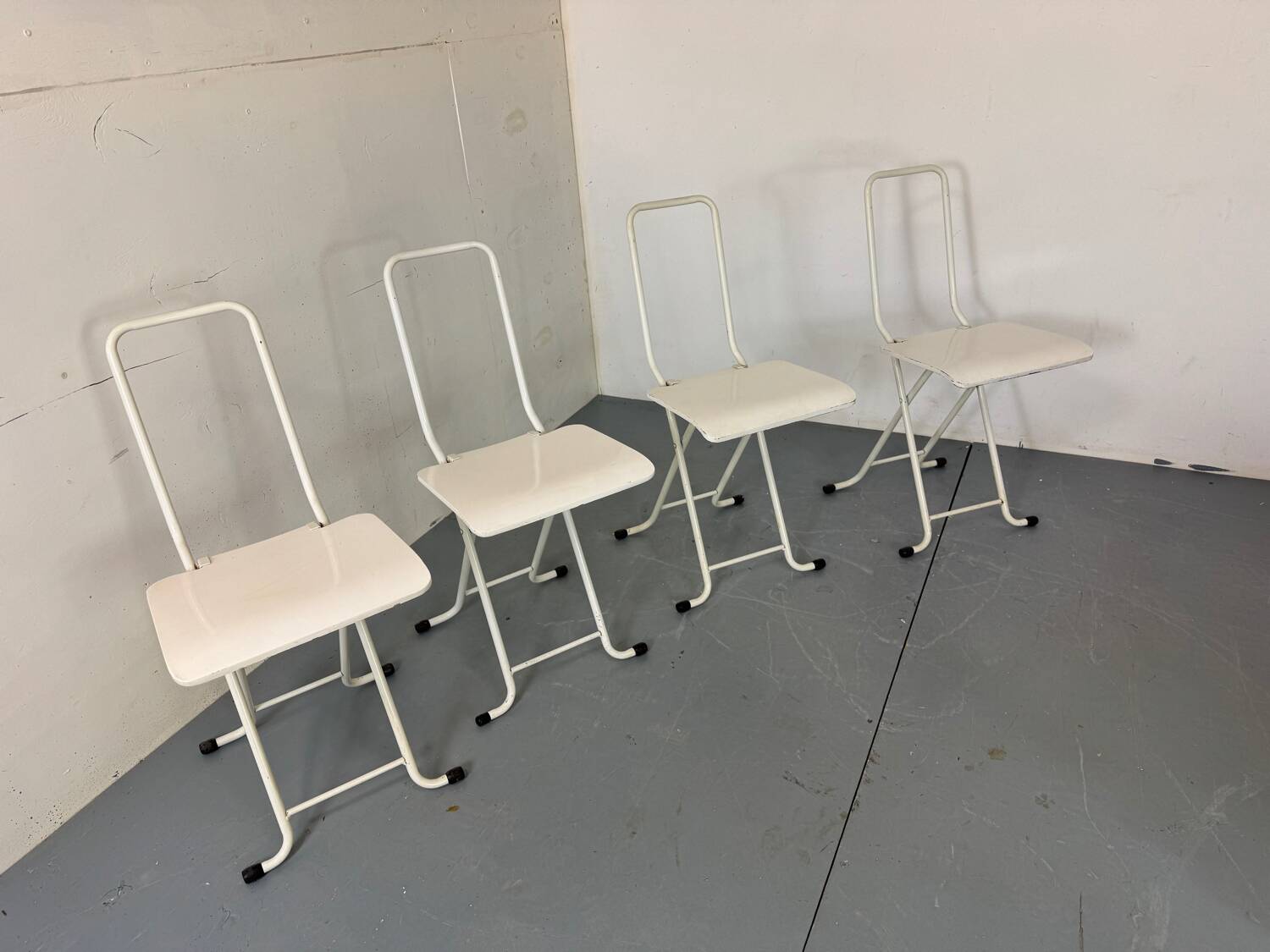 Set of 4 modernist Italian folding chairs,1980s