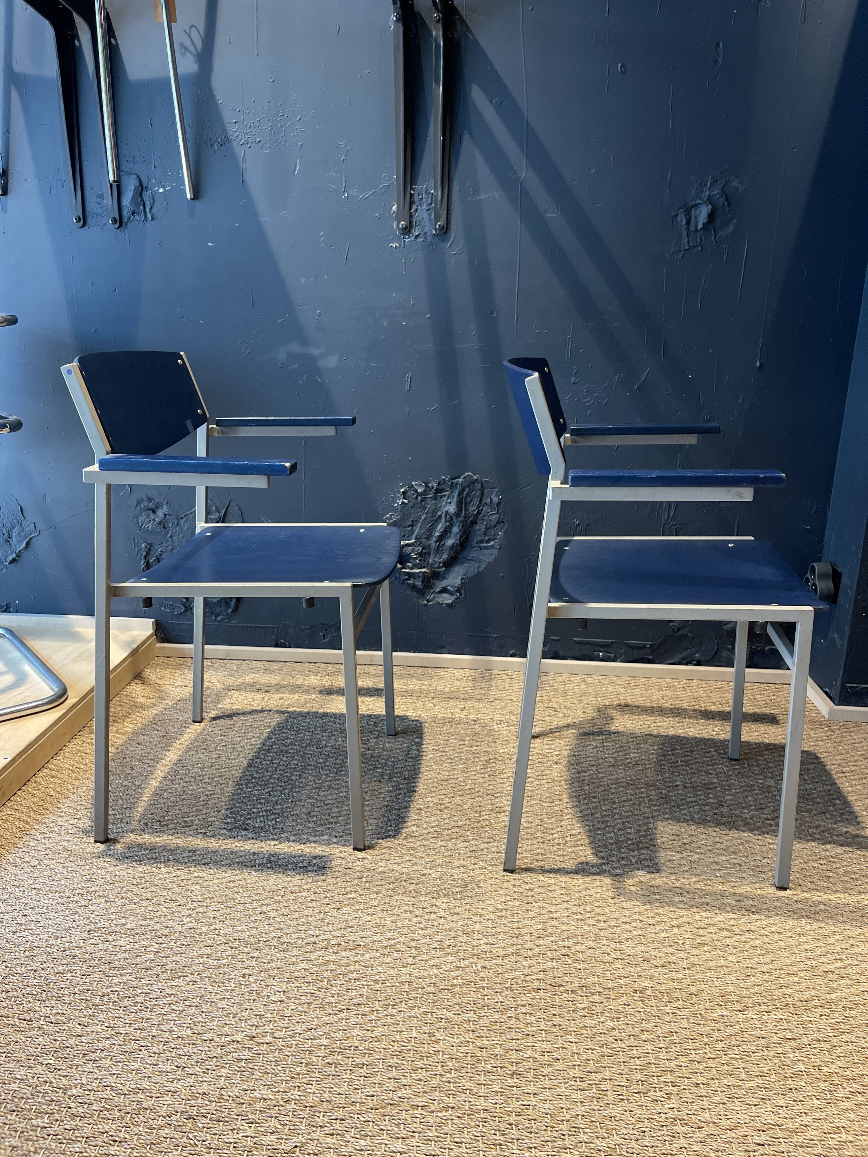 Pair of Gijs Van Der Sluis chairs with armrests in blue with grey steel legs