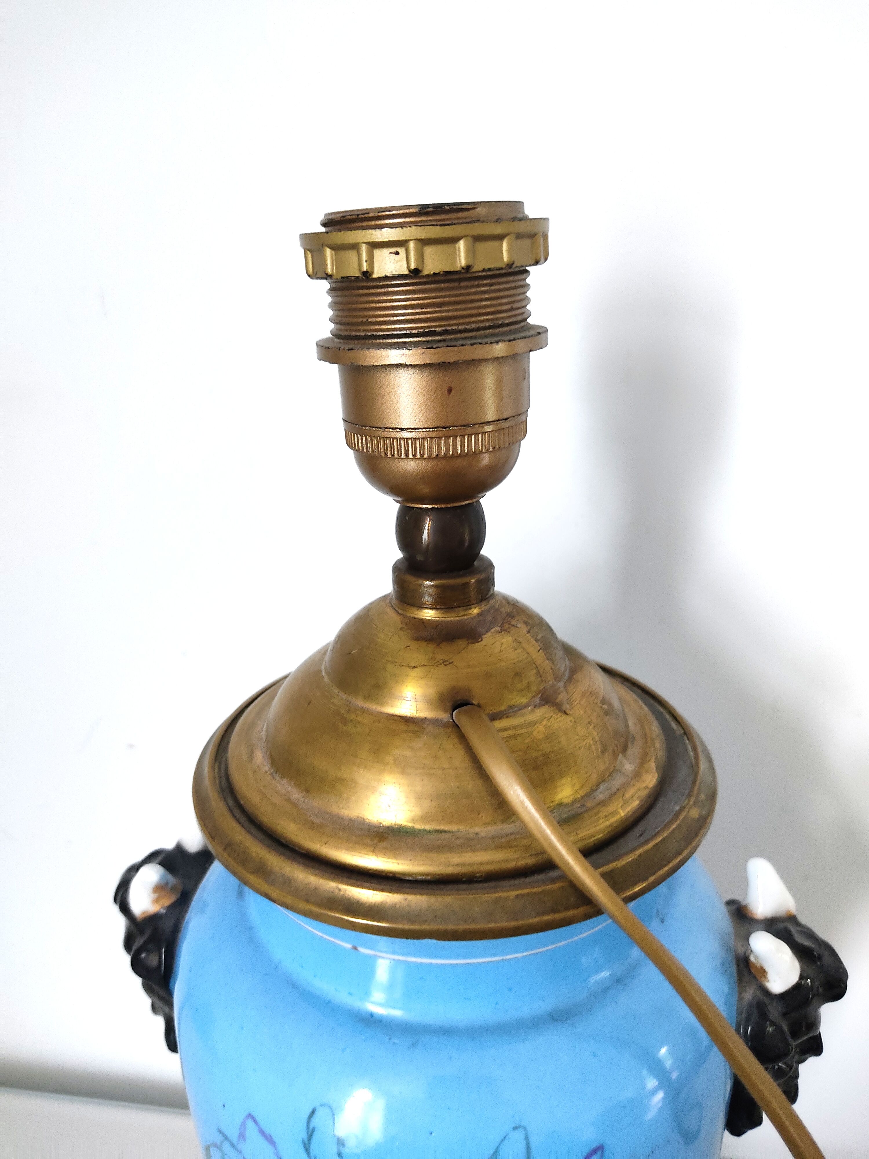 Lamp foot blue vase heads of fauna