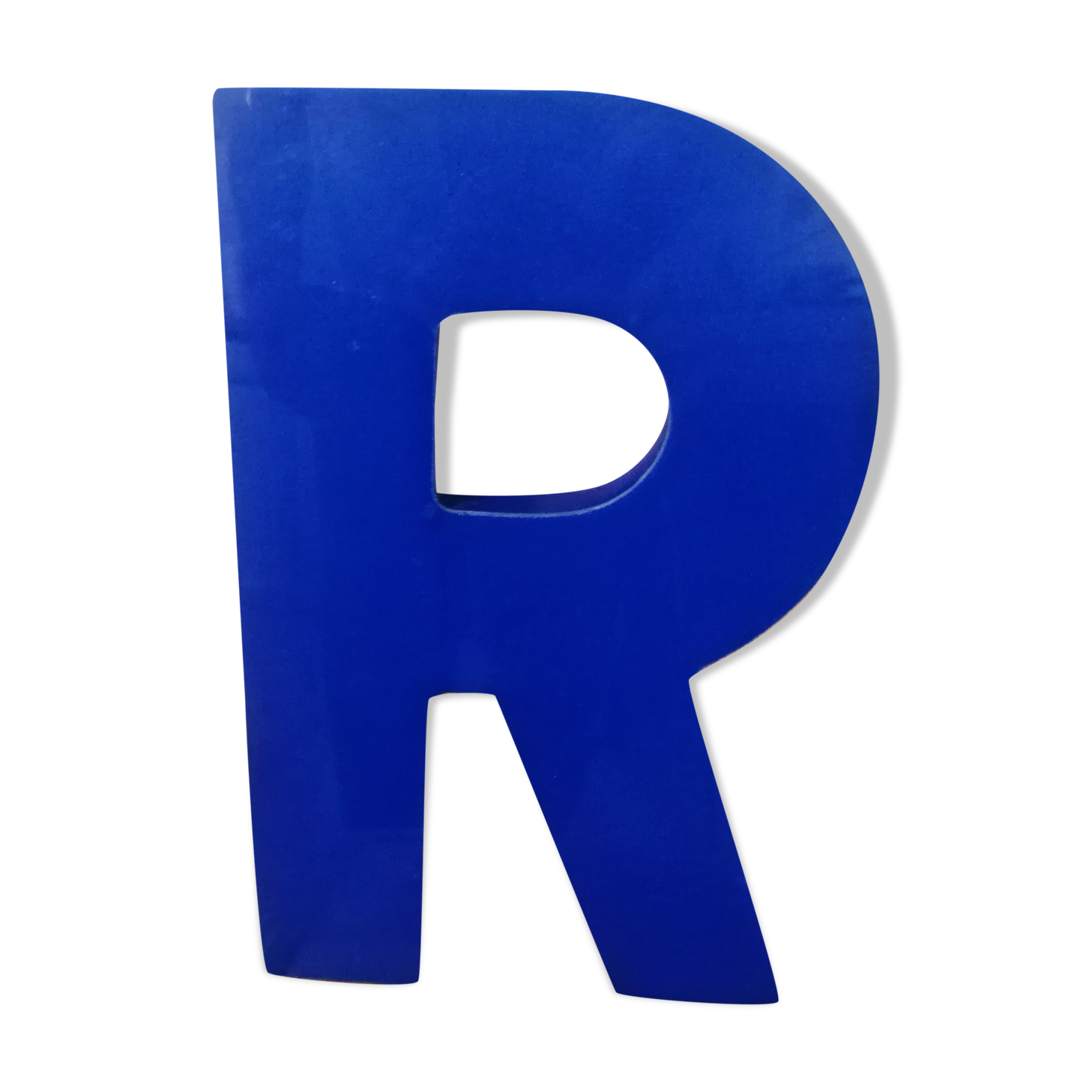 Letter R vintage sign in blue plexiglass
