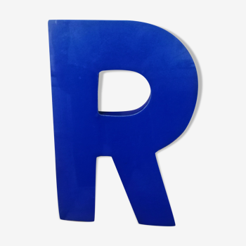 Letter R vintage sign in blue plexiglass