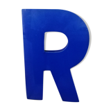 Letter R vintage sign in blue plexiglass