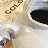 Clay-hued sandstone pitcher