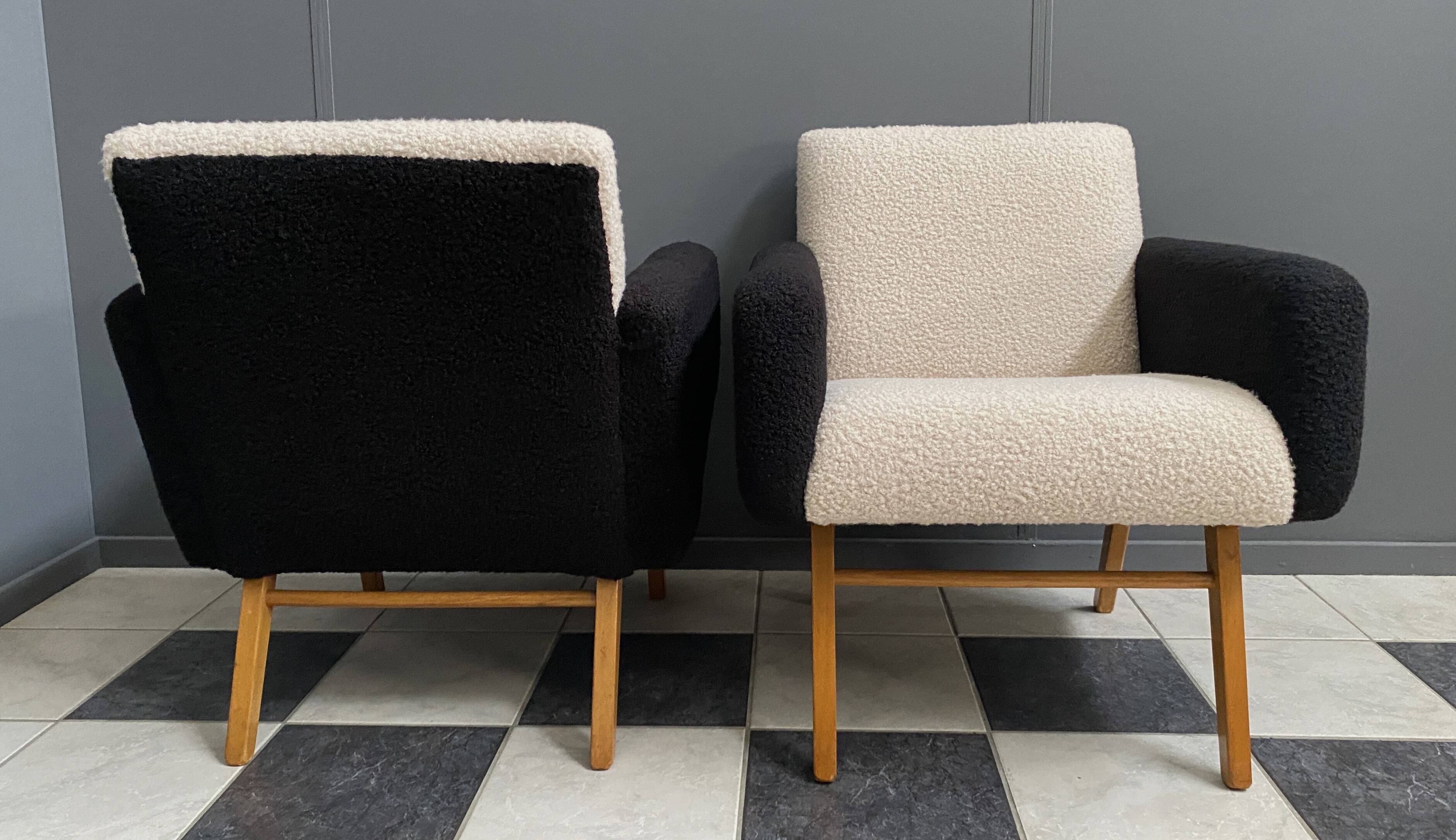 set of 2 black and White boucle lounge chairs 1960s