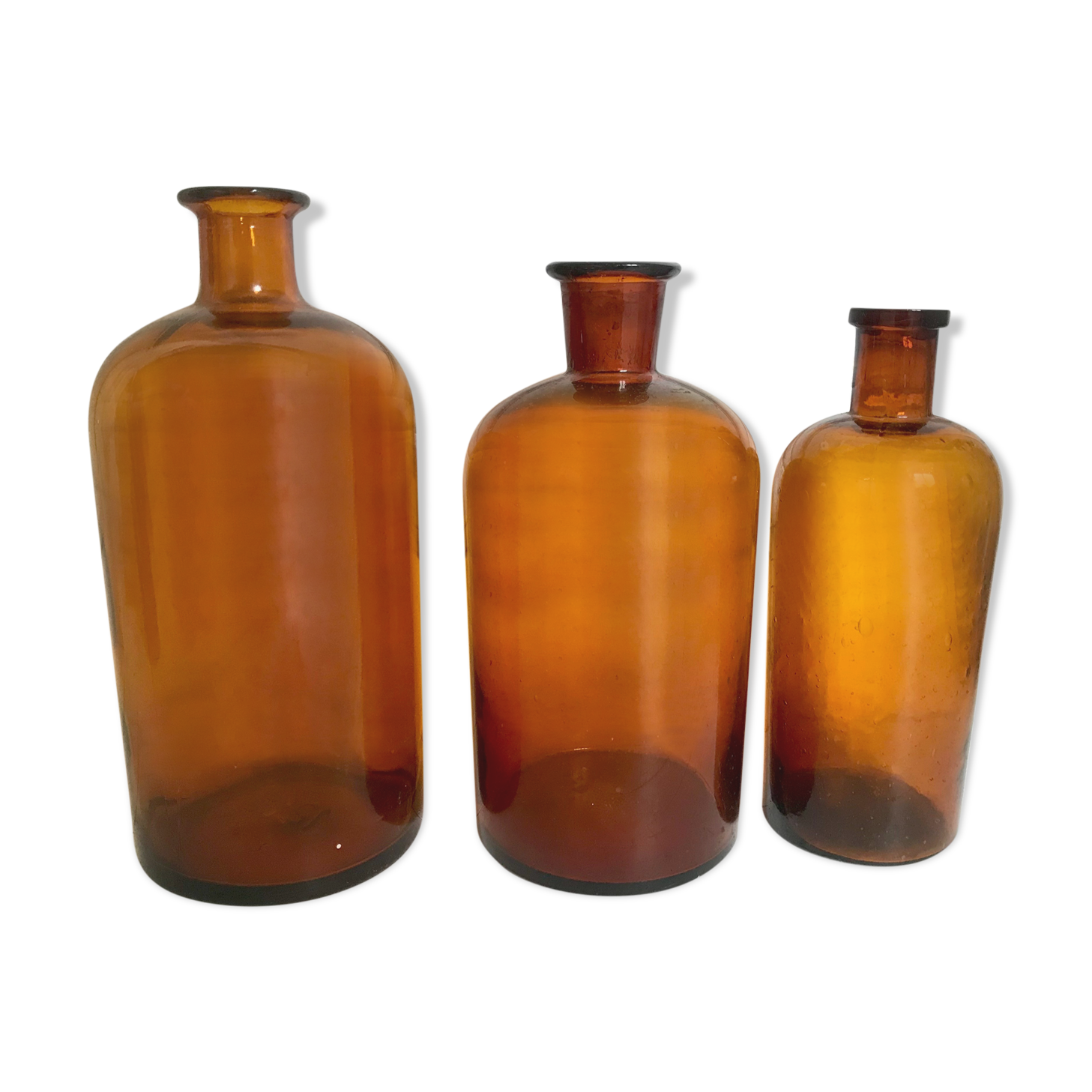 Trio of apothecary bottles