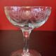 Early 20th century champagne glass burst by hand