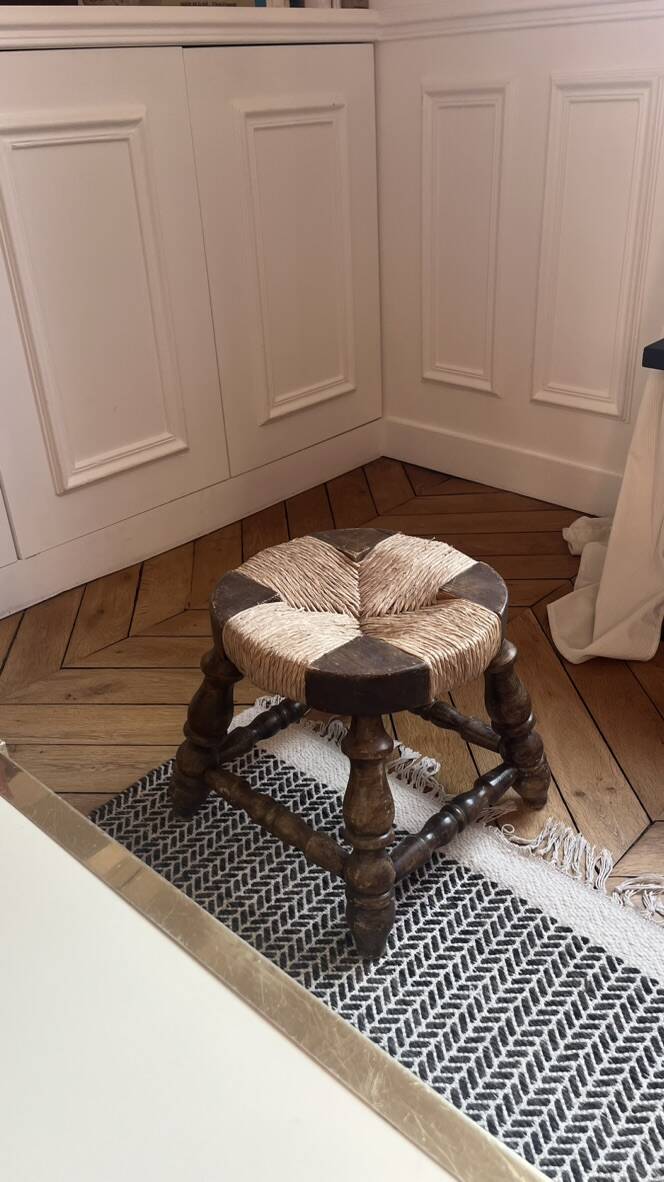 Rustic stool made of straw and wood