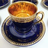 Service à café porcelaine Goumot-Labesse or et véritable bleu de four.