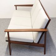 Scandinavian style three-seater sofa in teak, France circa 1950.