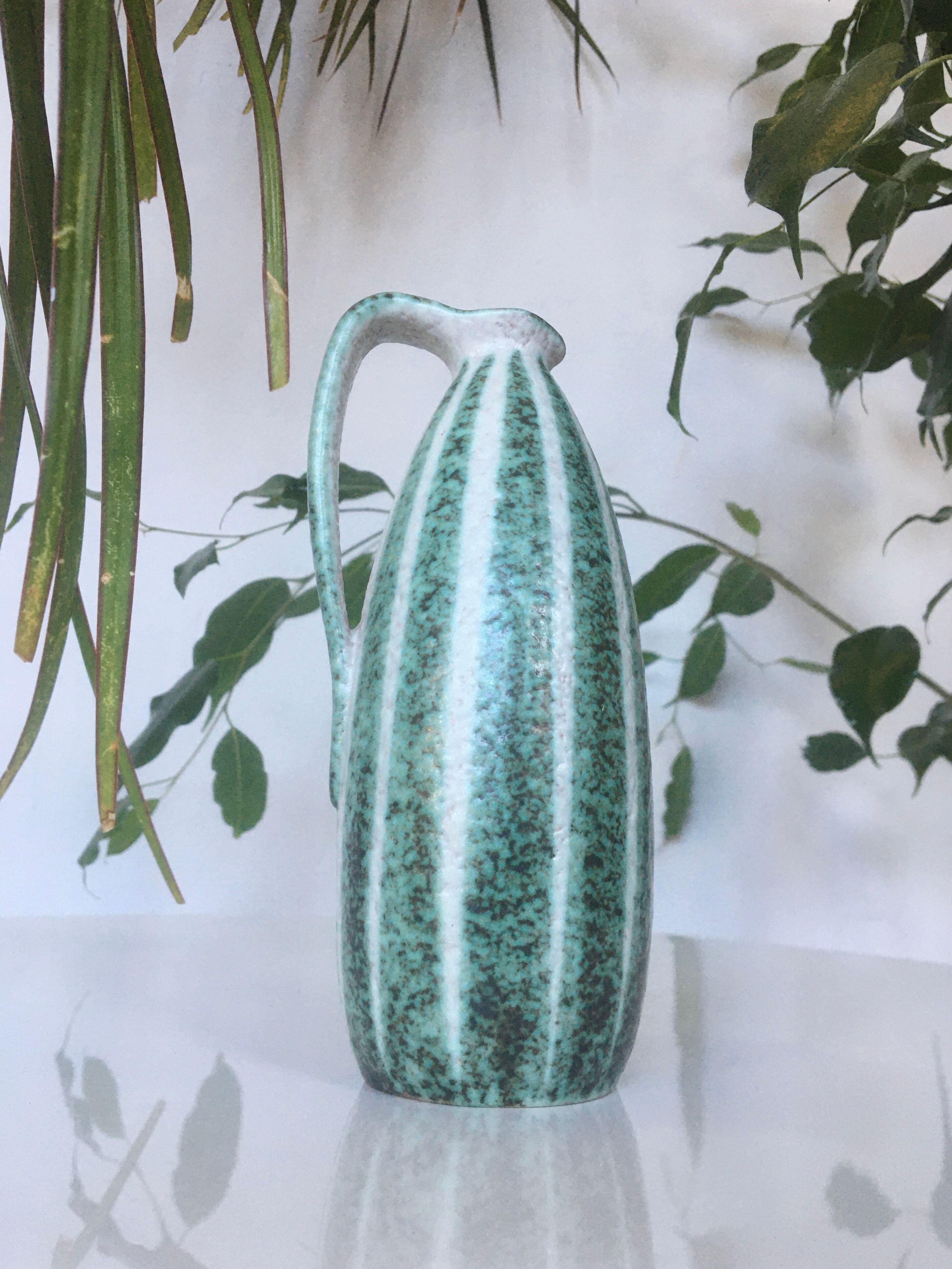 Signed and numbered art ceramics pitcher
