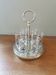 6 shot glasses on vintage metal support