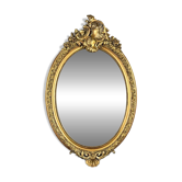 Oval gilded wooden mirror in Louis XV style, 19th century