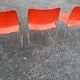 3 iron and plastic chairs