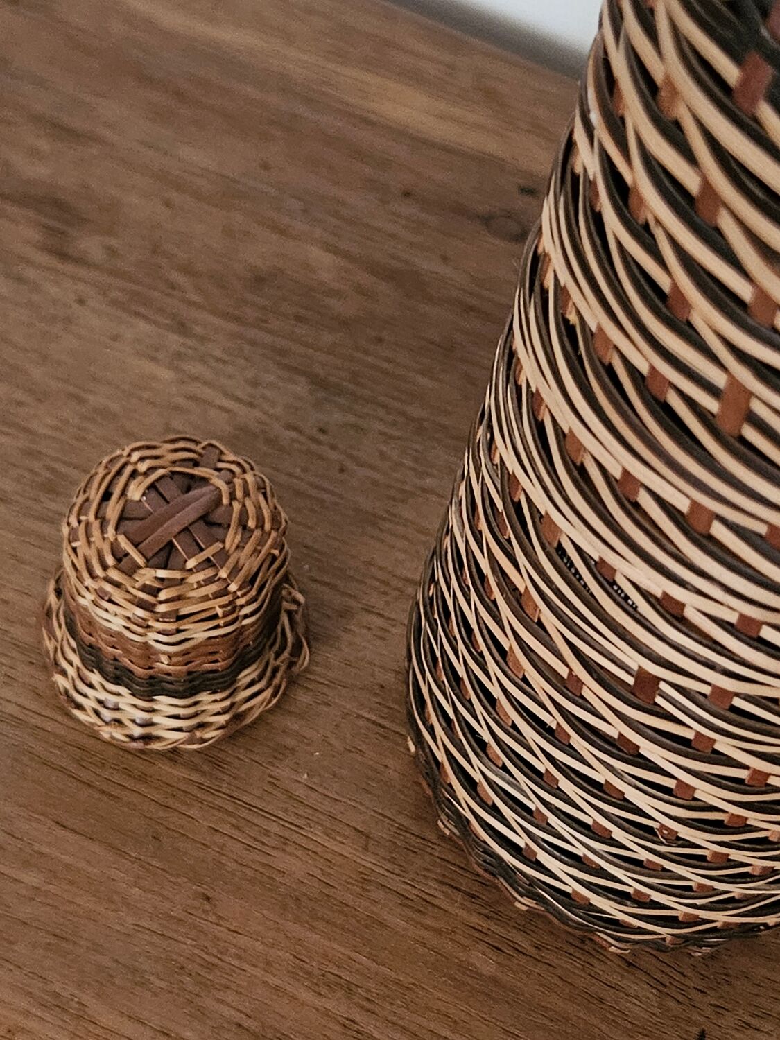 Glass and rattan bottle