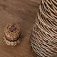 Glass and rattan bottle