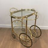 Oval brass trolley from Maison Baguès.