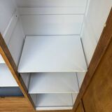 Display cabinet with hanging space