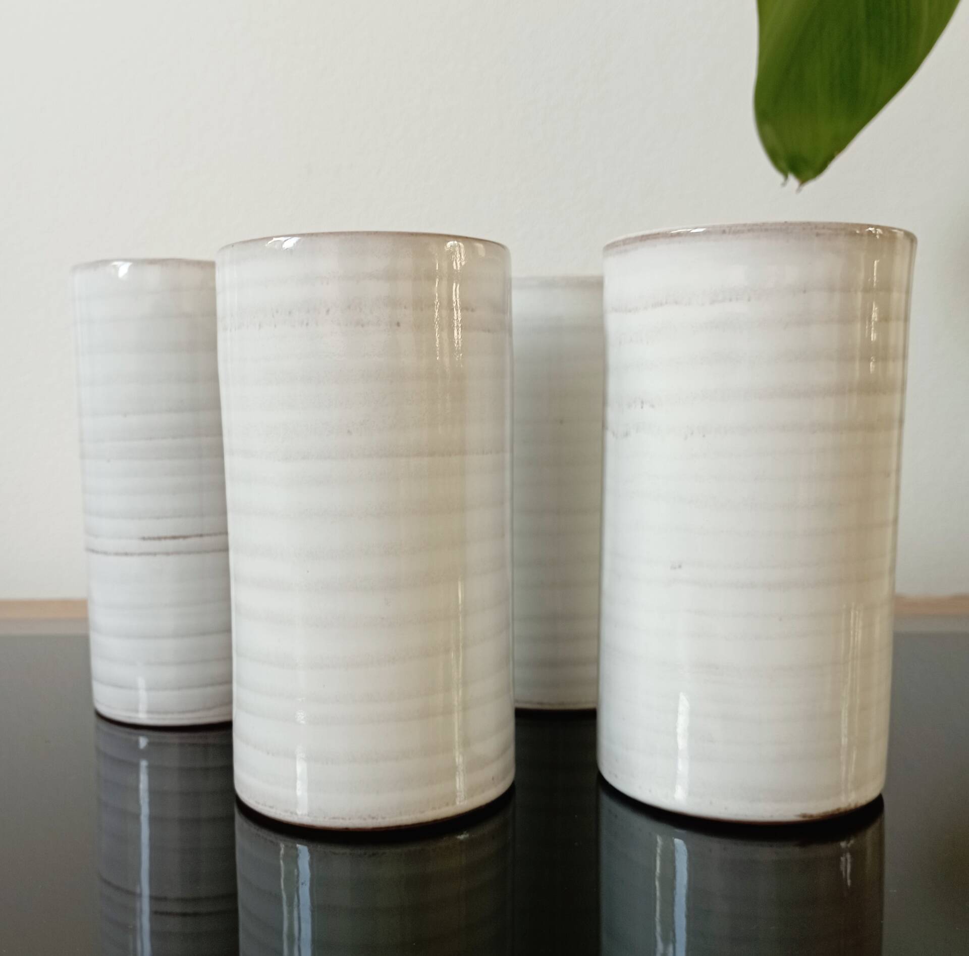 4 vintage stoneware cups in white