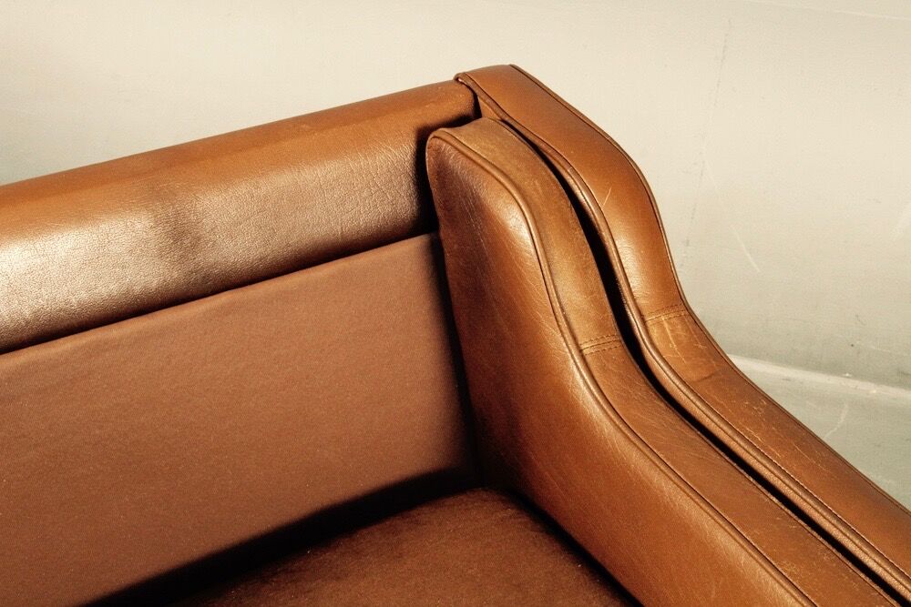 Armchair design Scandinavian brown leather.