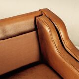 Armchair design Scandinavian brown leather.
