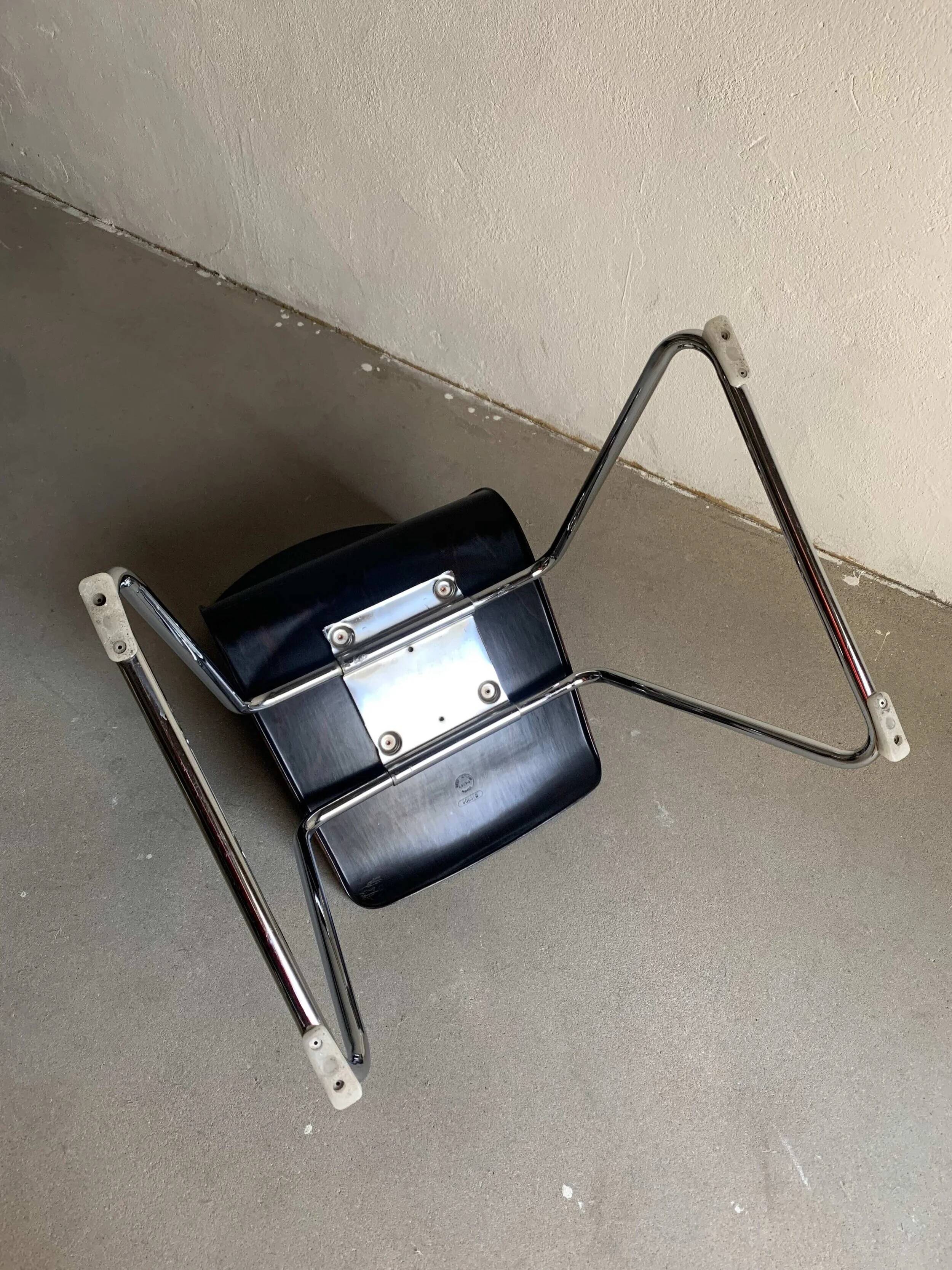 7 Pagholtz tubular steel stackable dining chairs | West Germany | 1960s