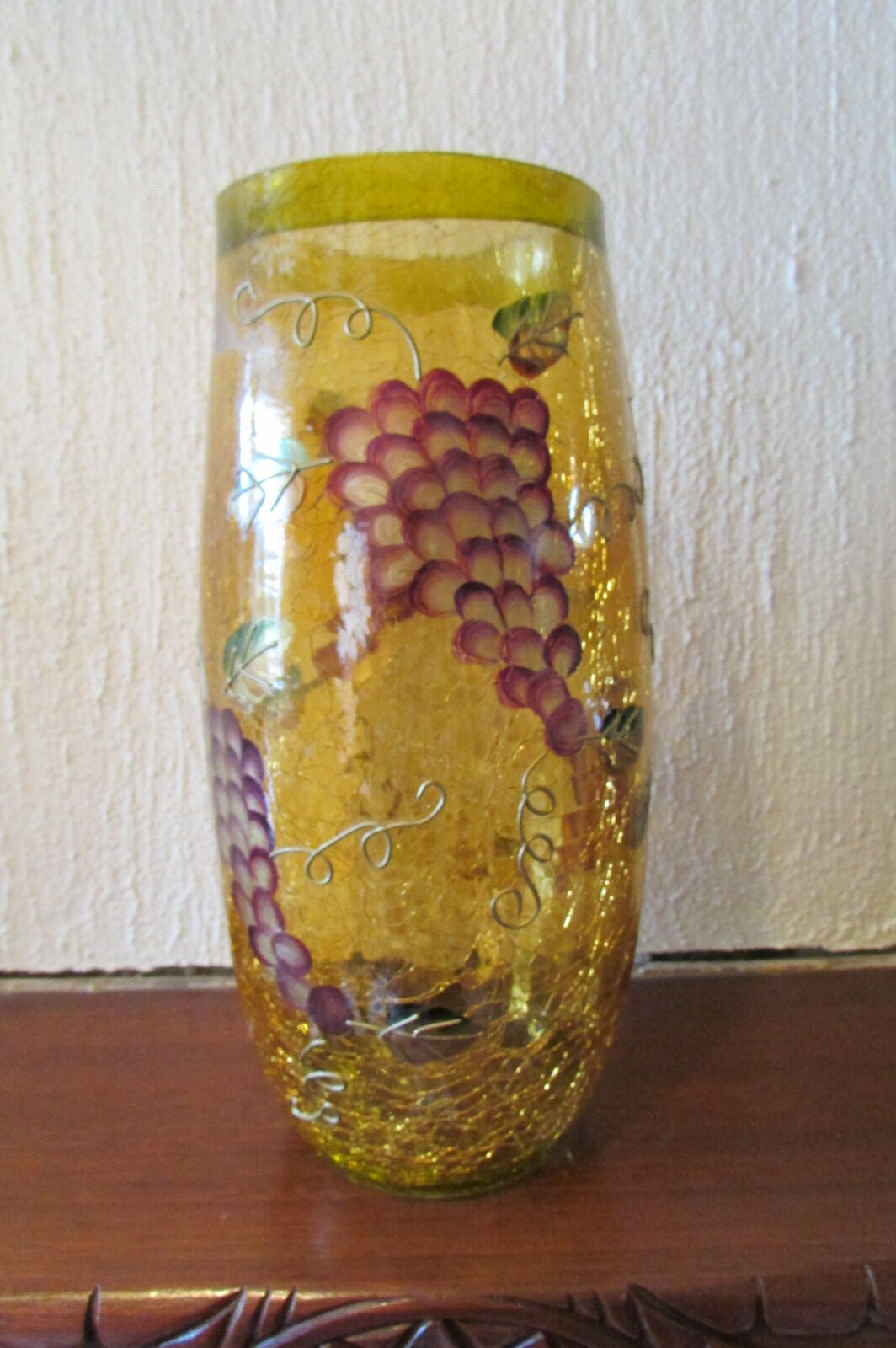 Yellow glass vase, cracked paint, grape motifs