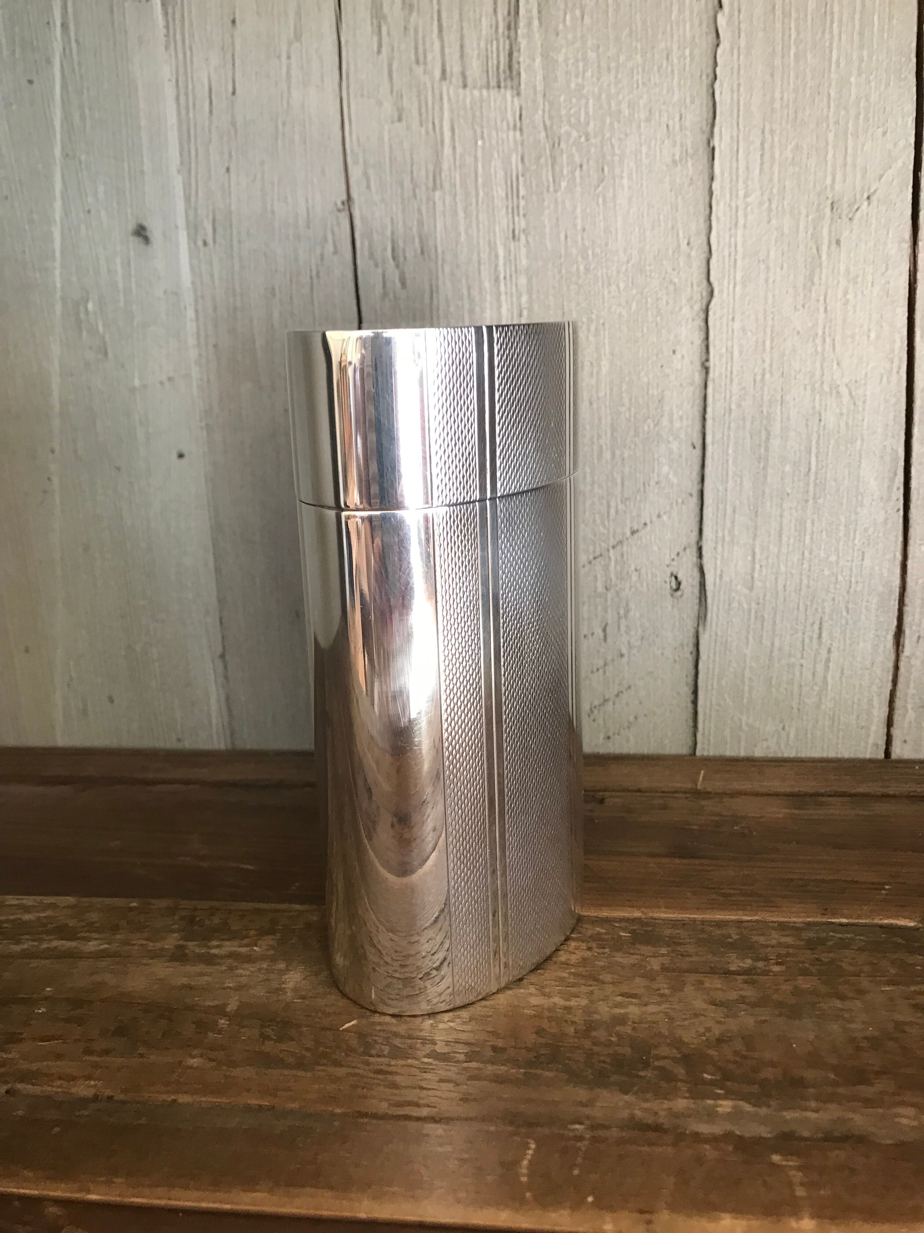 Guilloché silver metal oval cigar box