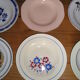 Set of 12 different hollow plates