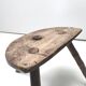 Brutalist tripod stool in solid wood half round