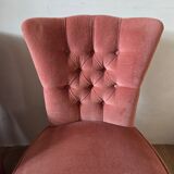 A pair of small tub chairs.