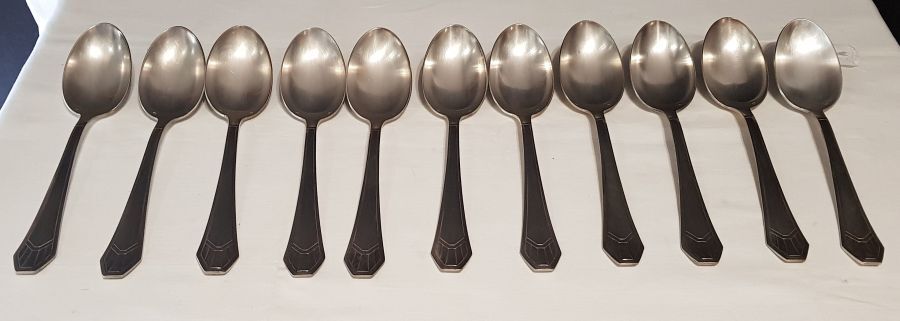 23-piece silver metal art deco cutlery set