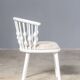 Matte white painted beech chair with upholstered seat in fabric 1970