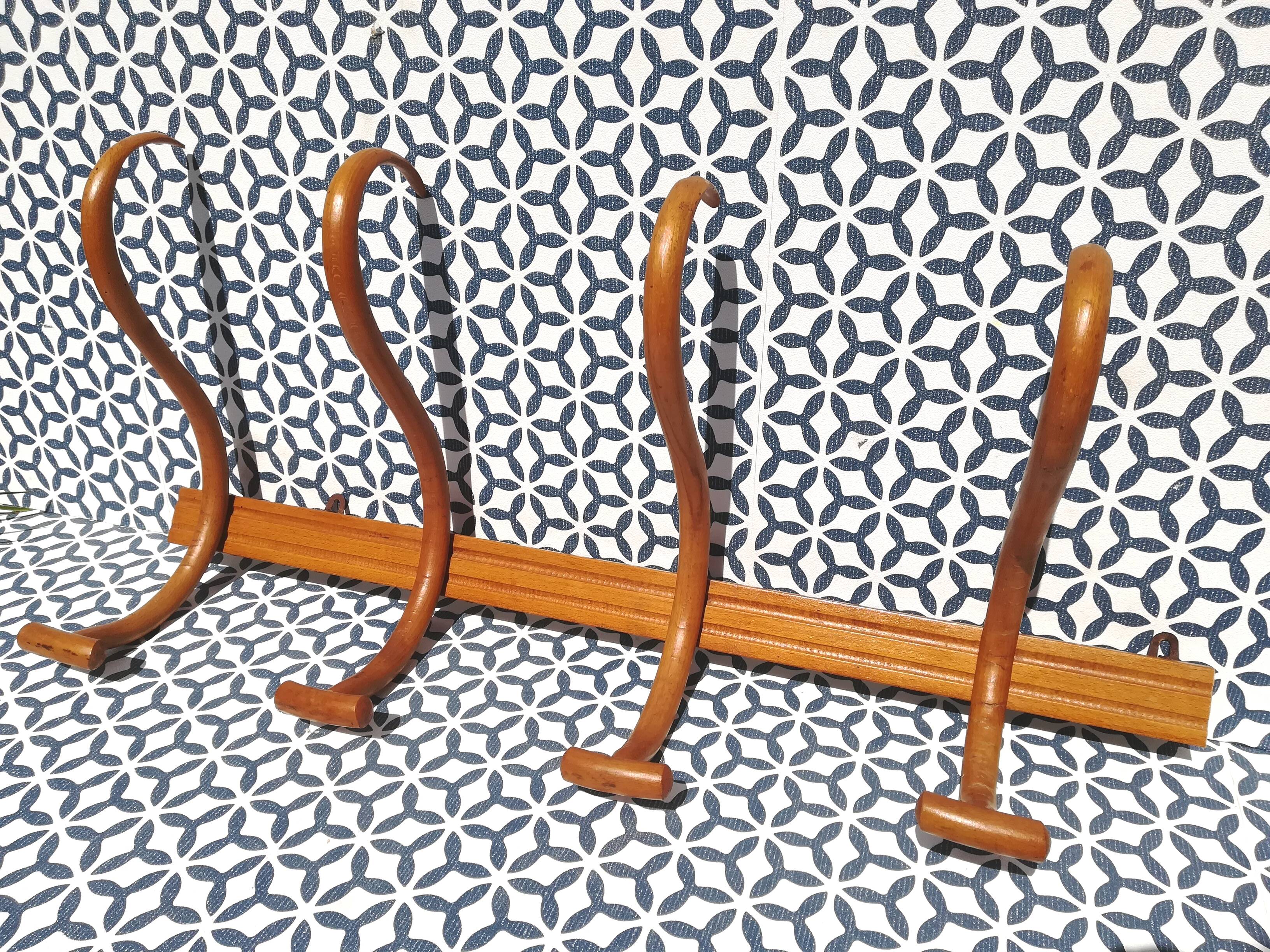 Patère wears Mahieu coat