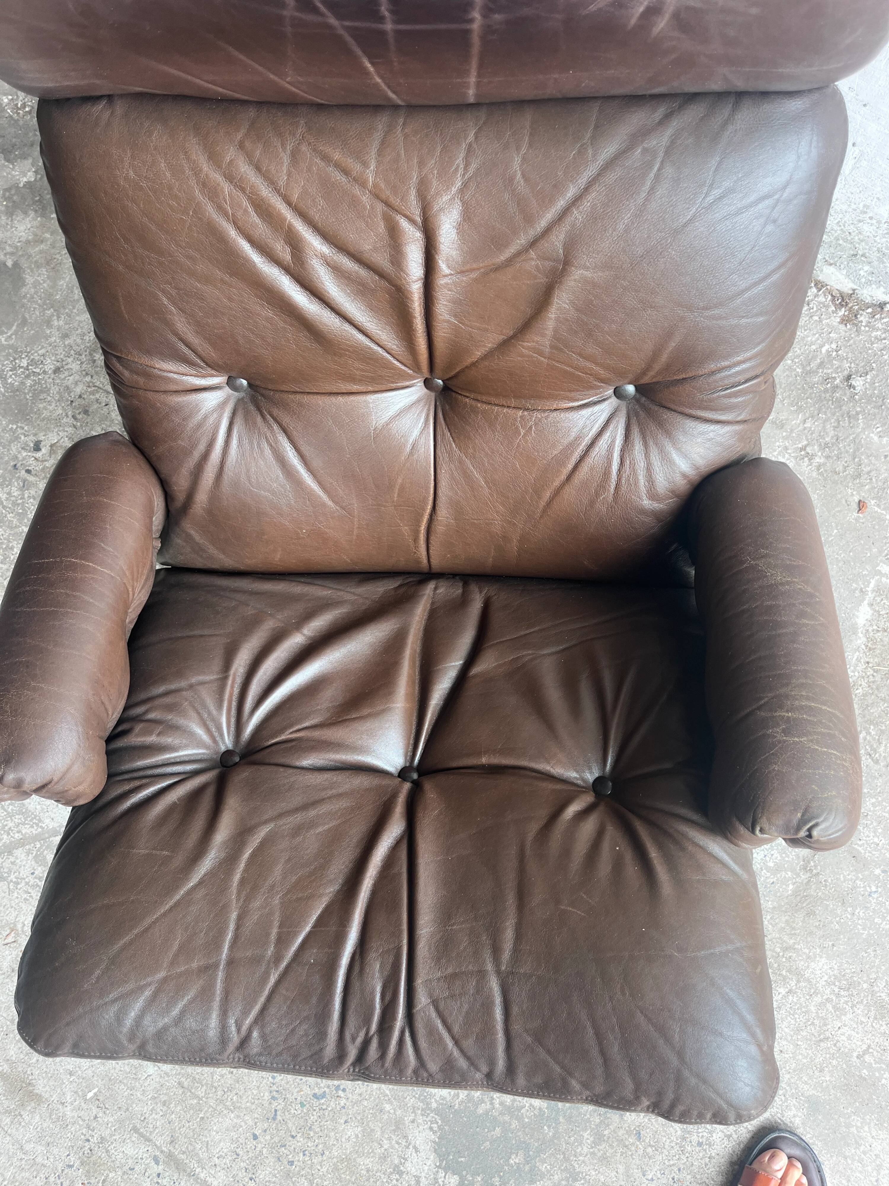 Vintage Scandinavian swivel lounge chair in leather, 1970s