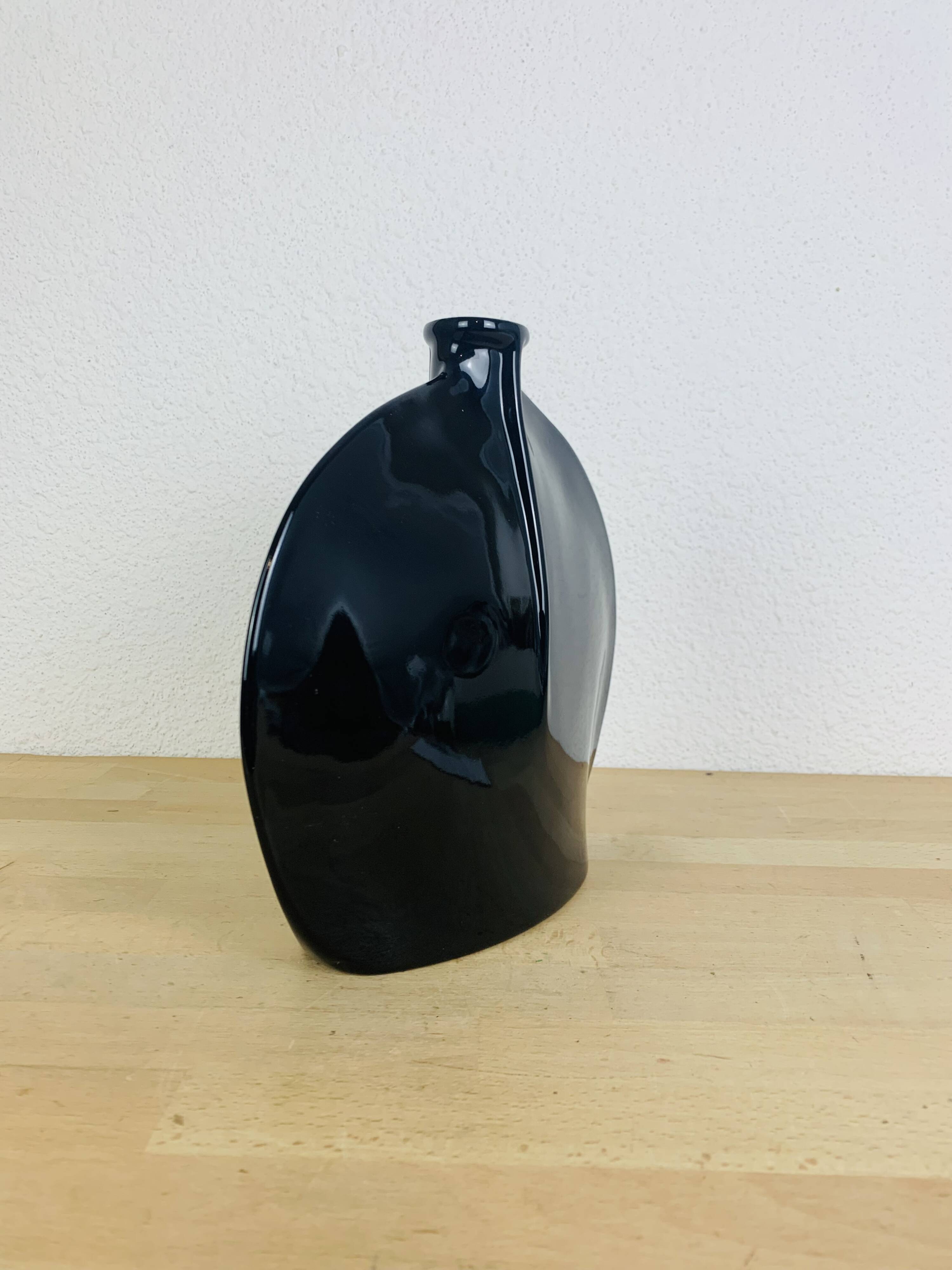 Vintage black ceramic lentil vase