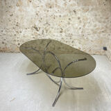 Smoked glass oval table from the 1970s.