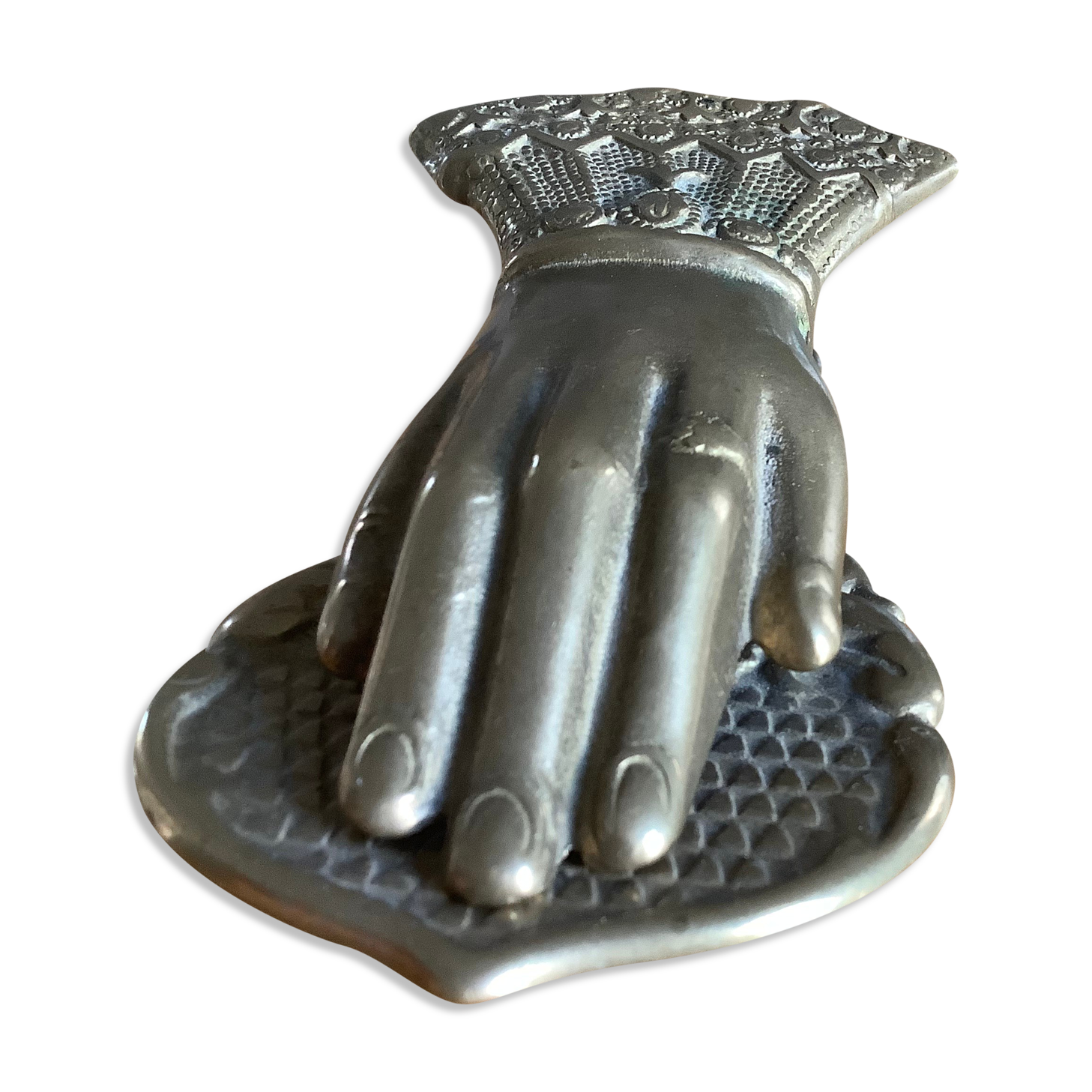 Brass paper press hand shape