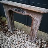 Patinated wooden fireplace