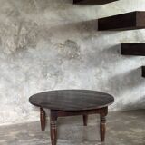 Coffee table, round antique Indonesian teak table with straight legs.