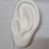 Empty pocket in the shape of an ear
