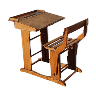 Old desk school desk for vintage wooden children sitting at adjustable height