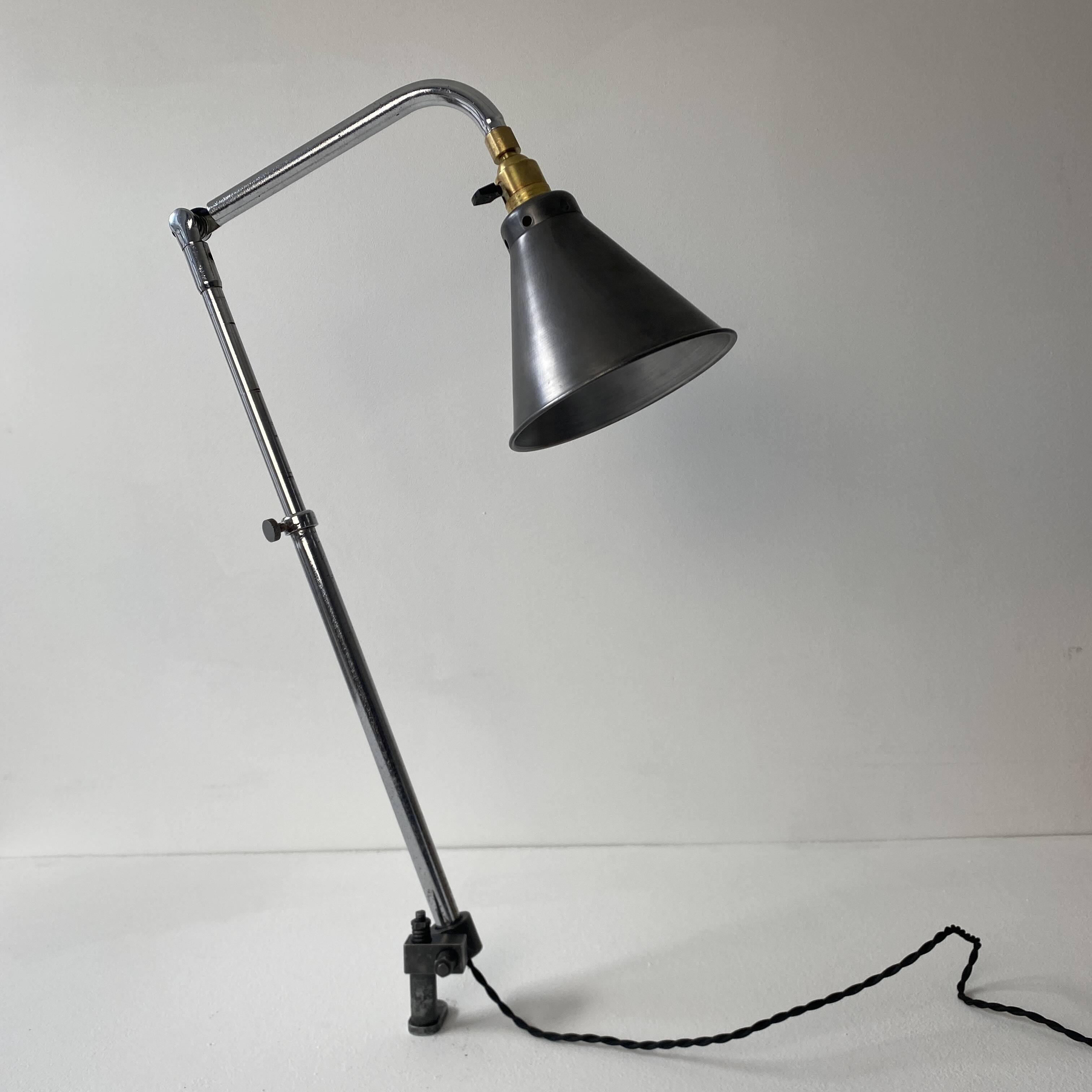 Old industrial wall light that is vintage.